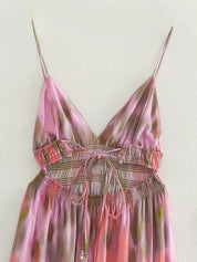 Maxi dress with open back, model Daniella