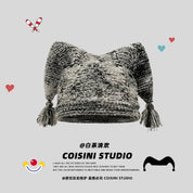 Tasseled Jester Knit Beanie