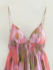 Maxi dress with open back, model Daniella