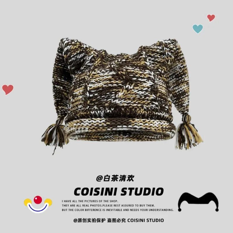 Tasseled Jester Knit Beanie